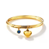 Bracciale Rigido a Tre Fili con Ciondolo Cuore e Occhio di Allah — foto 1